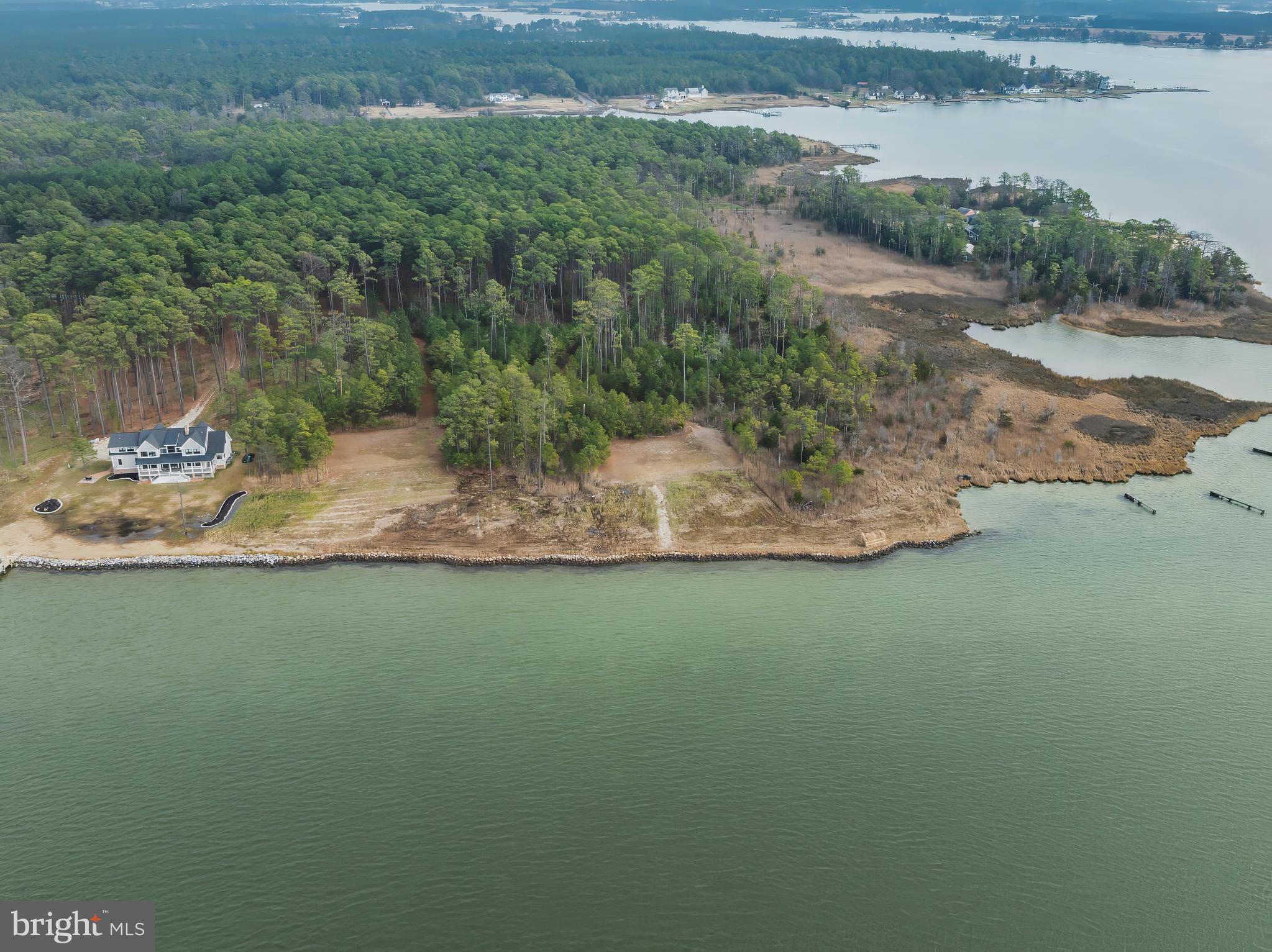 5200 Travelers Rest Road Cambridge, MD 21613 - Photo 15 of 27 a view of a lake from a yard