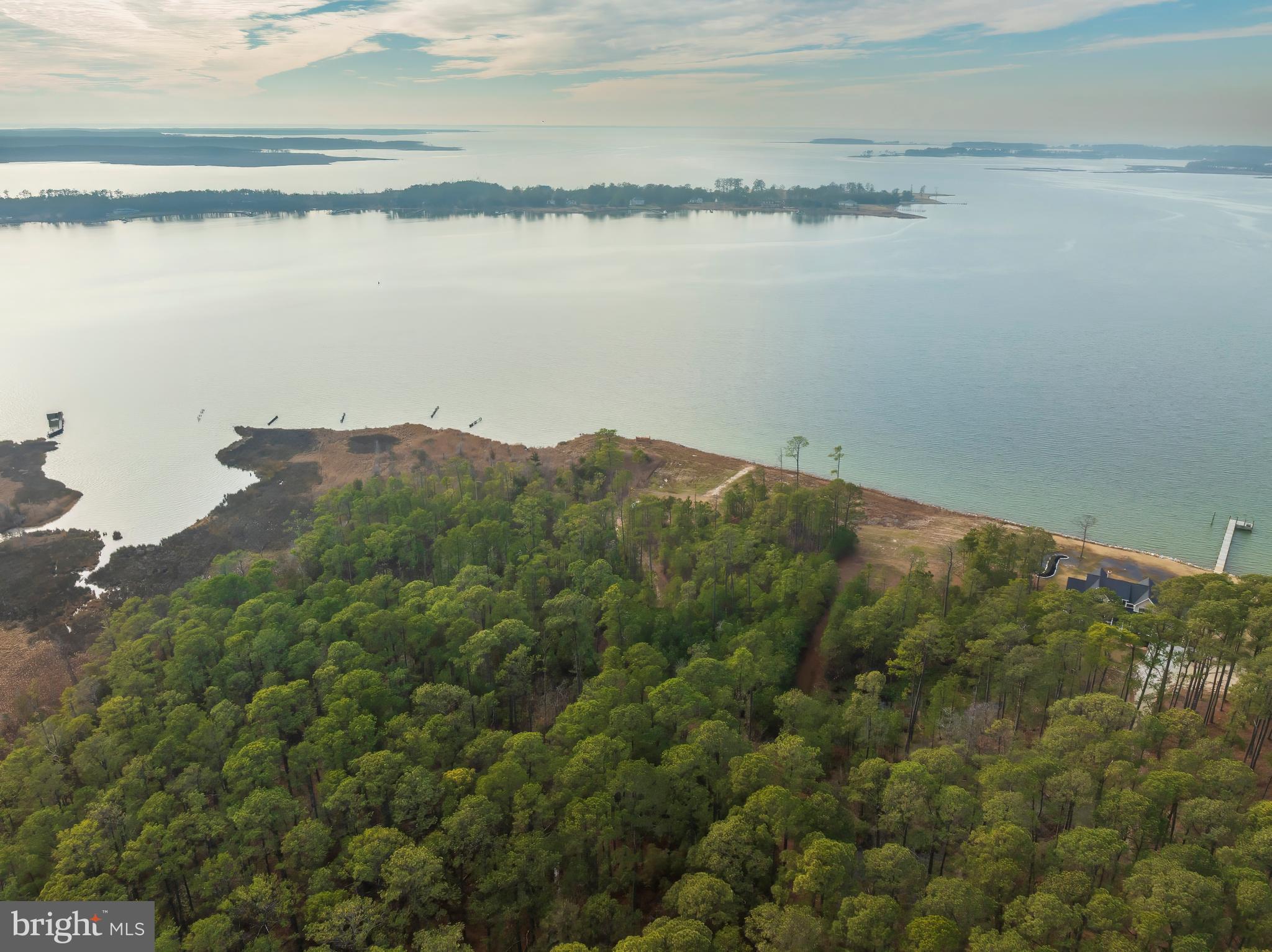 5200 Travelers Rest Road Cambridge, MD 21613 - Photo 19 of 27 a view of a lake with a mountain in the background