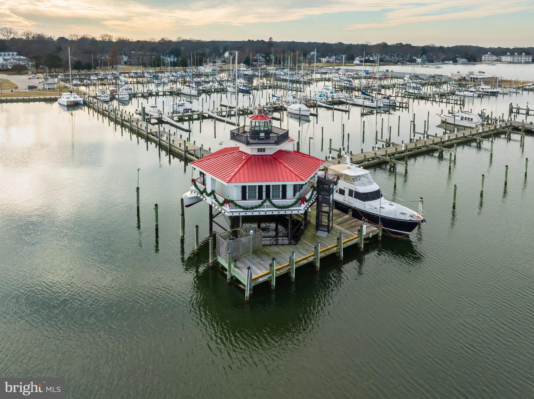 5200 Travelers Rest Road Cambridge, MD 21613 - Photo 22 of 27 a swimming pool with outdoor seating and lake view