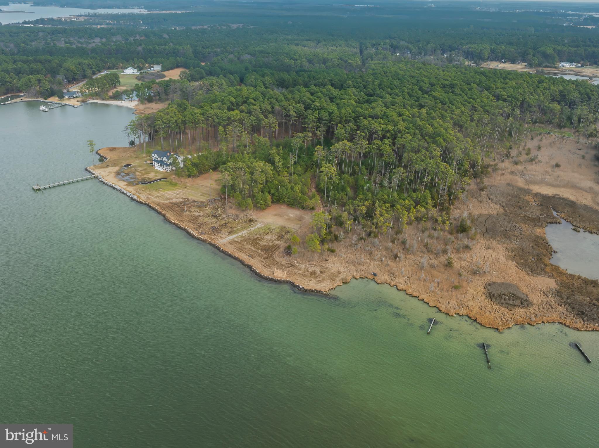 5200 Travelers Rest Road Cambridge, MD 21613 - Photo 9 of 27 a view of a lake from a yard
