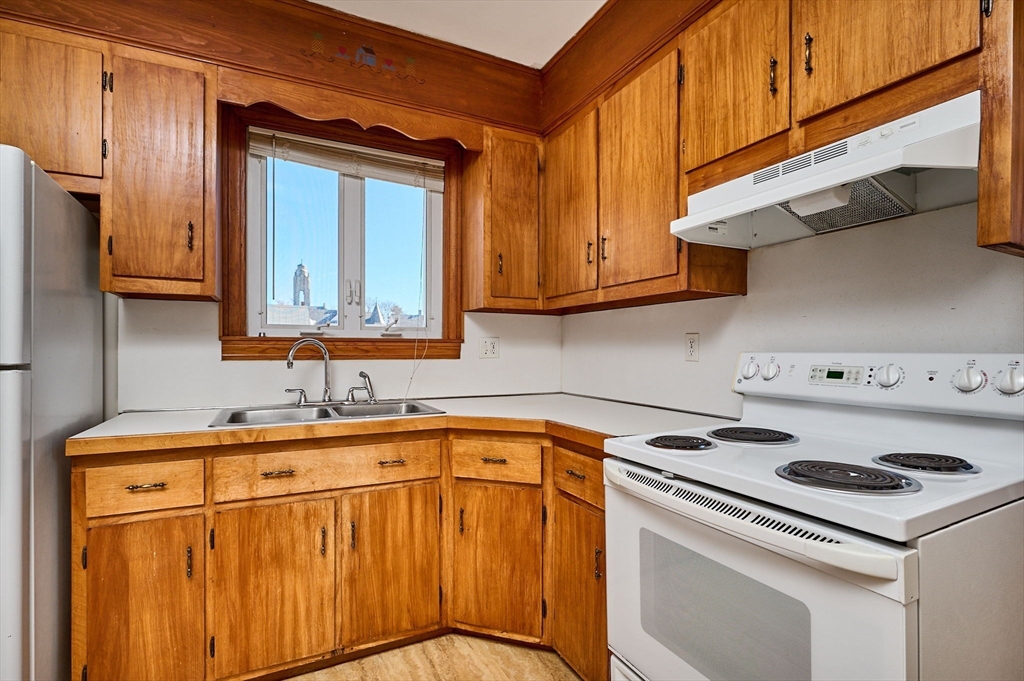 5 Ruggles Street Three Rivers, MA 01080 - Photo 2 of 30 a kitchen with a sink cabinets and appliances