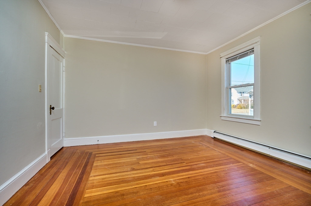 5 Ruggles Street Three Rivers, MA 01080 - Photo 10 of 30 a view of a room with wooden floor and white walls