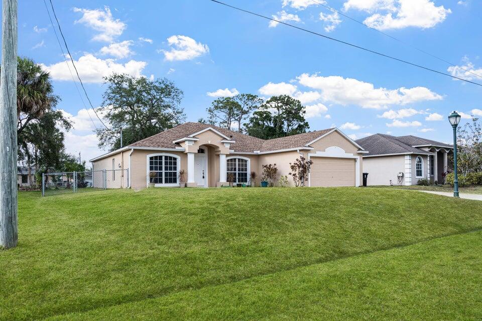 1573 Southwest Fortune Road Port St. Lucie, FL 34953 - Photo 1 of 16 FRONT