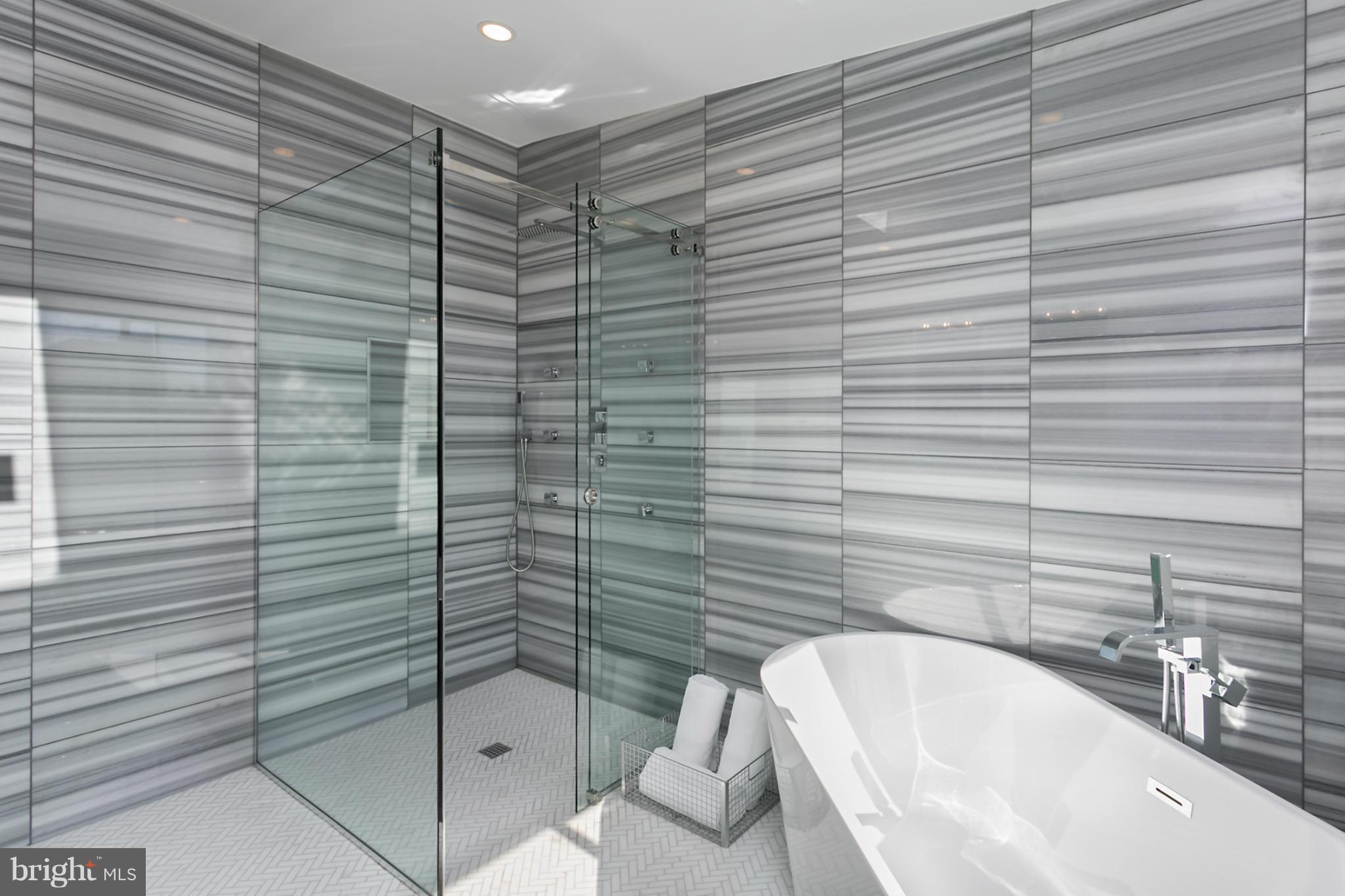 7533 12th Street Northwest Washington, DC 20012 - Photo 22 of 30 a bathroom with a bathtub and shower