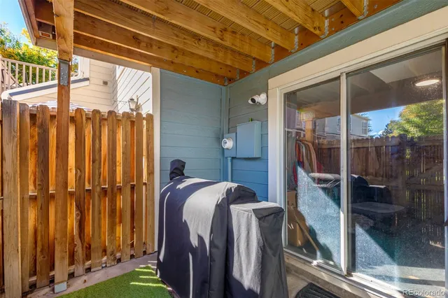 a view of a balcony with chairs