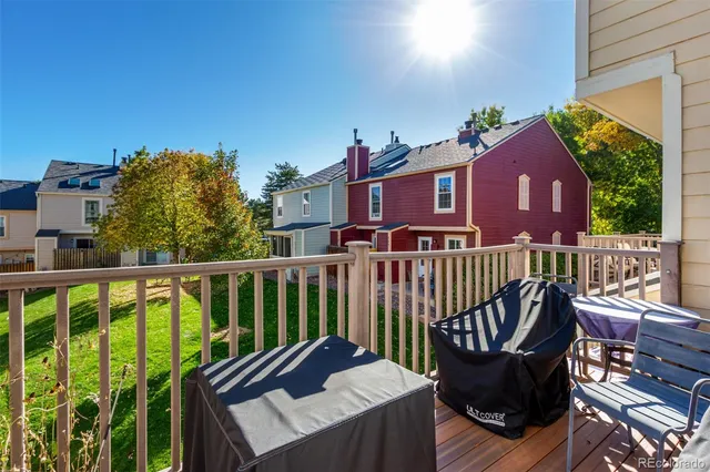 a view of a two chairs in the deck