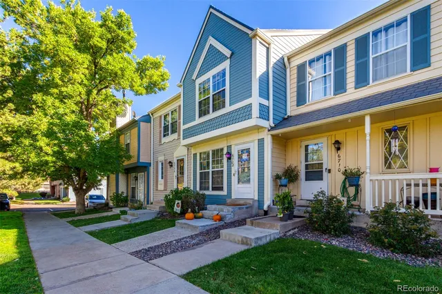 a view of a brick building with a yard