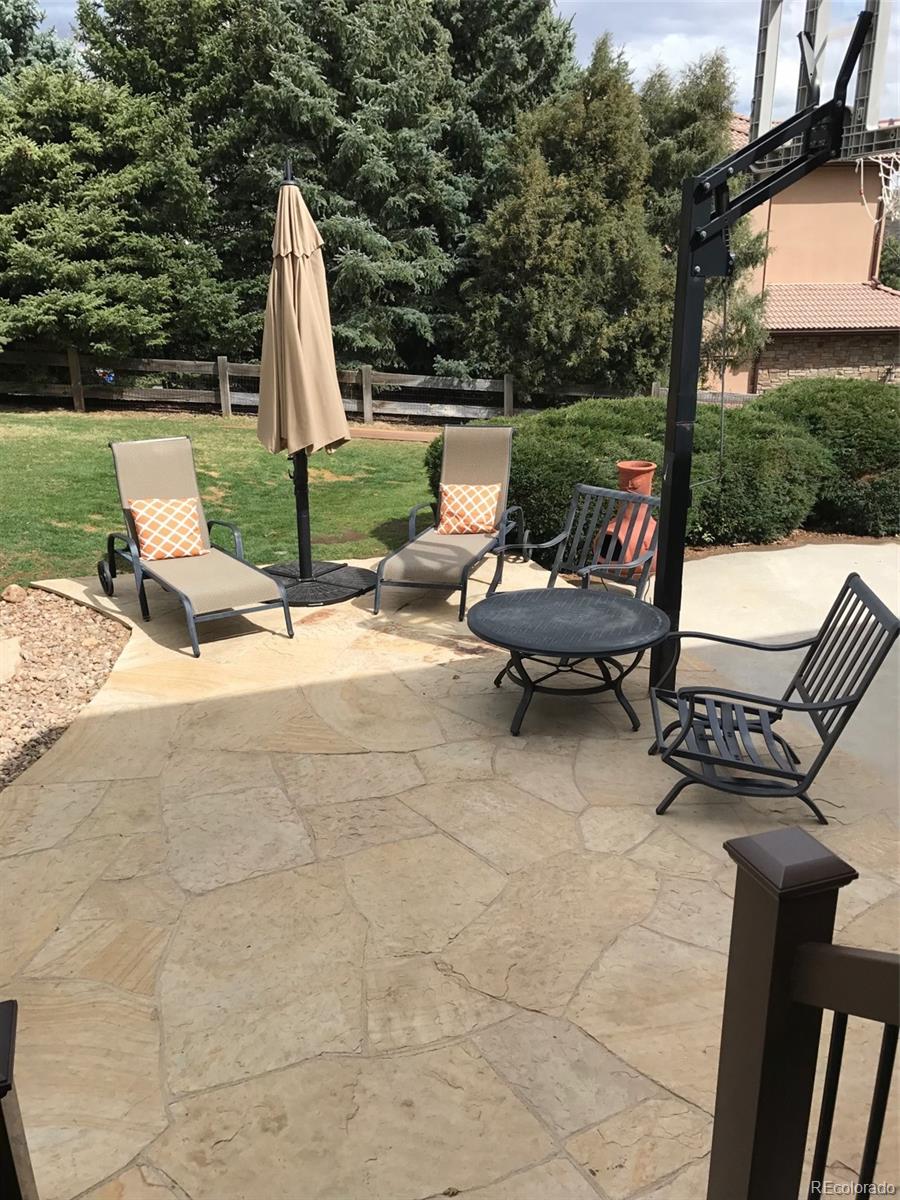 81 North Ranch Road Littleton, CO 80127 - Photo 30 of 38 a view of outdoor space with seating area