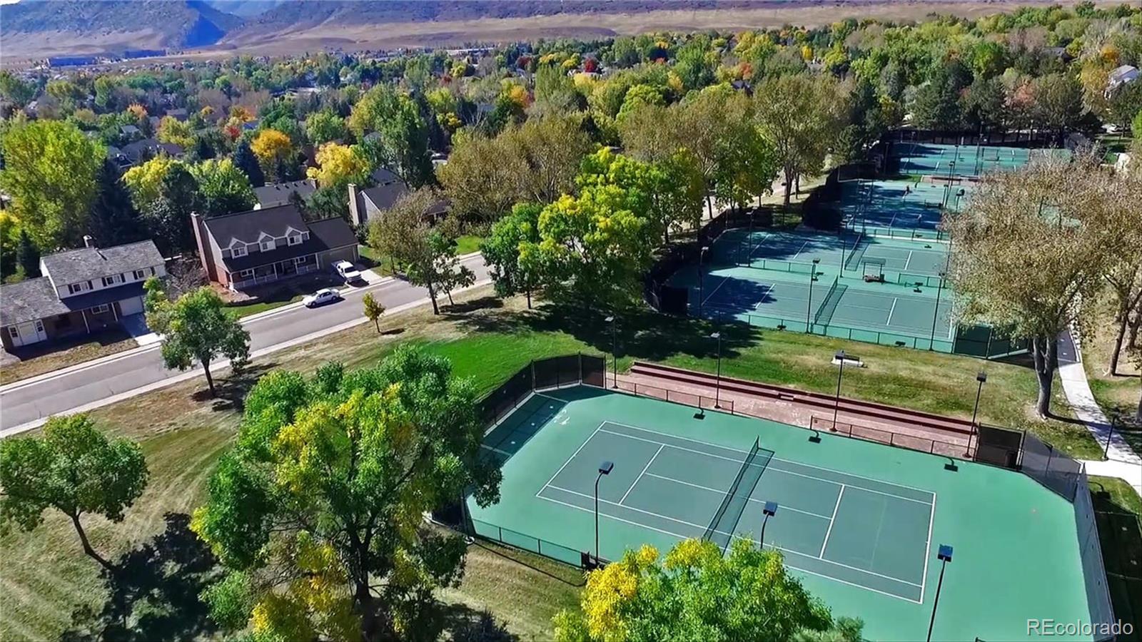 81 North Ranch Road Littleton, CO 80127 - Photo 35 of 38 an aerial view of a house with a garden