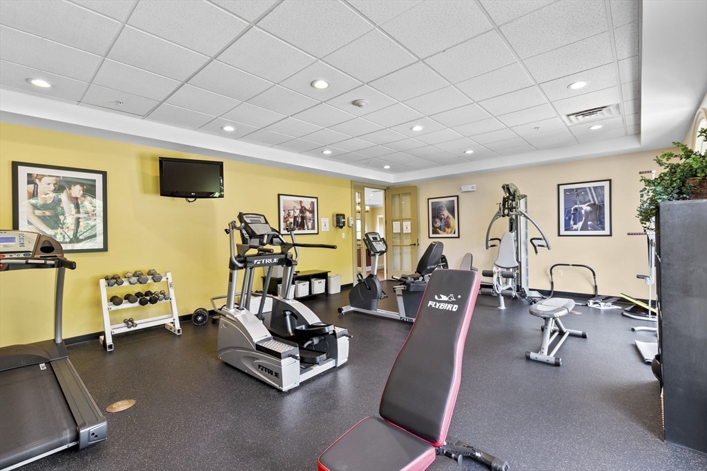 59 Walpole Street, Unit 116 Canton, MA 02021 - Photo 22 of 26 a view of a room with gym equipment