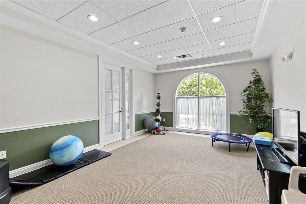 59 Walpole Street, Unit 116 Canton, MA 02021 - Photo 24 of 26 a very nice looking room with a large window