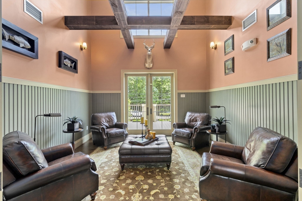59 Walpole Street, Unit 116 Canton, MA 02021 - Photo 25 of 26 a living room with furniture and a window