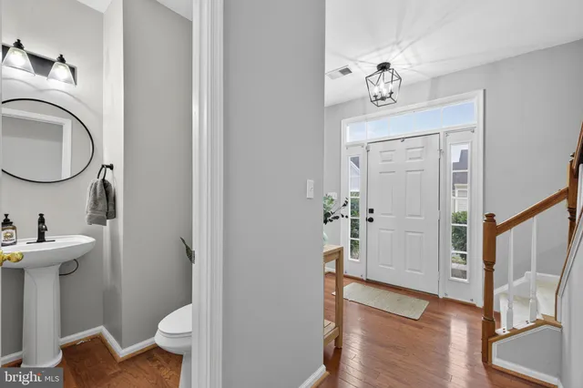 a bathroom with a toilet and a sink