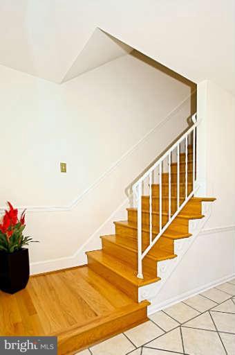 7401 Range Road Alexandria, VA 22306 - Photo 8 of 30 Staircase to Upper Level