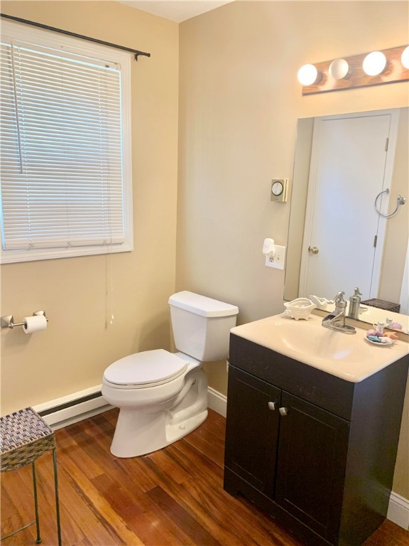 85 Quannacut Road, Unit A Westerly, RI 02891 - Photo 13 of 19 Half bathroom on first floor with laundry area attached.
