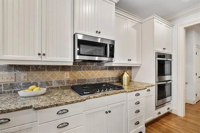 $967,500 | 7107 Lake Henson Drive, Summerfield, NC 27358