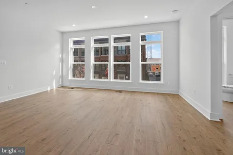 a bathroom with a shower and a sink