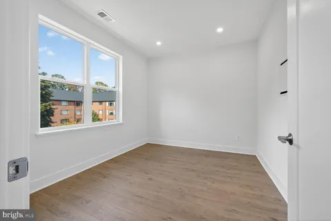 a bathroom with a toilet sink and shower