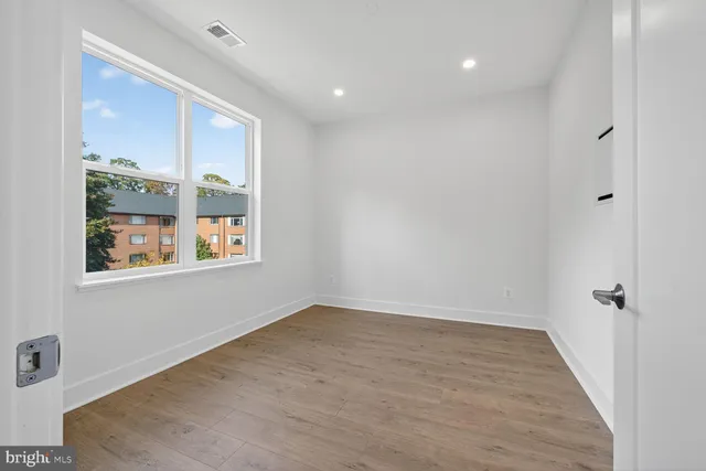 a bathroom with a toilet sink and shower
