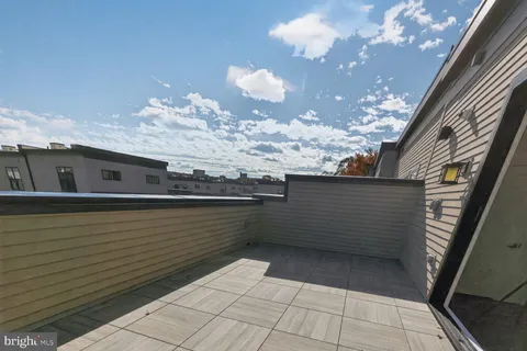 a view of a balcony with an outdoor space