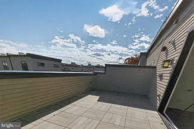 a view of a balcony with an outdoor space
