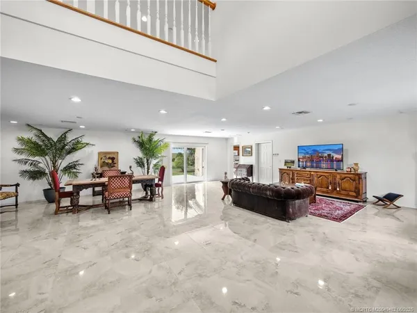 a living room with furniture and a couch