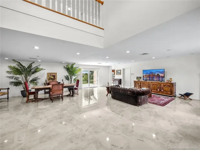 a living room with furniture and a couch