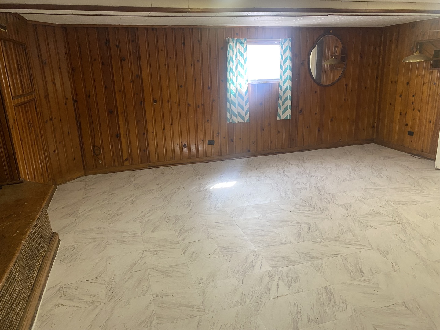 5514 North Mango Avenue, Unit G Chicago, IL 60630 - Photo 4 of 9 a view of empty room with window