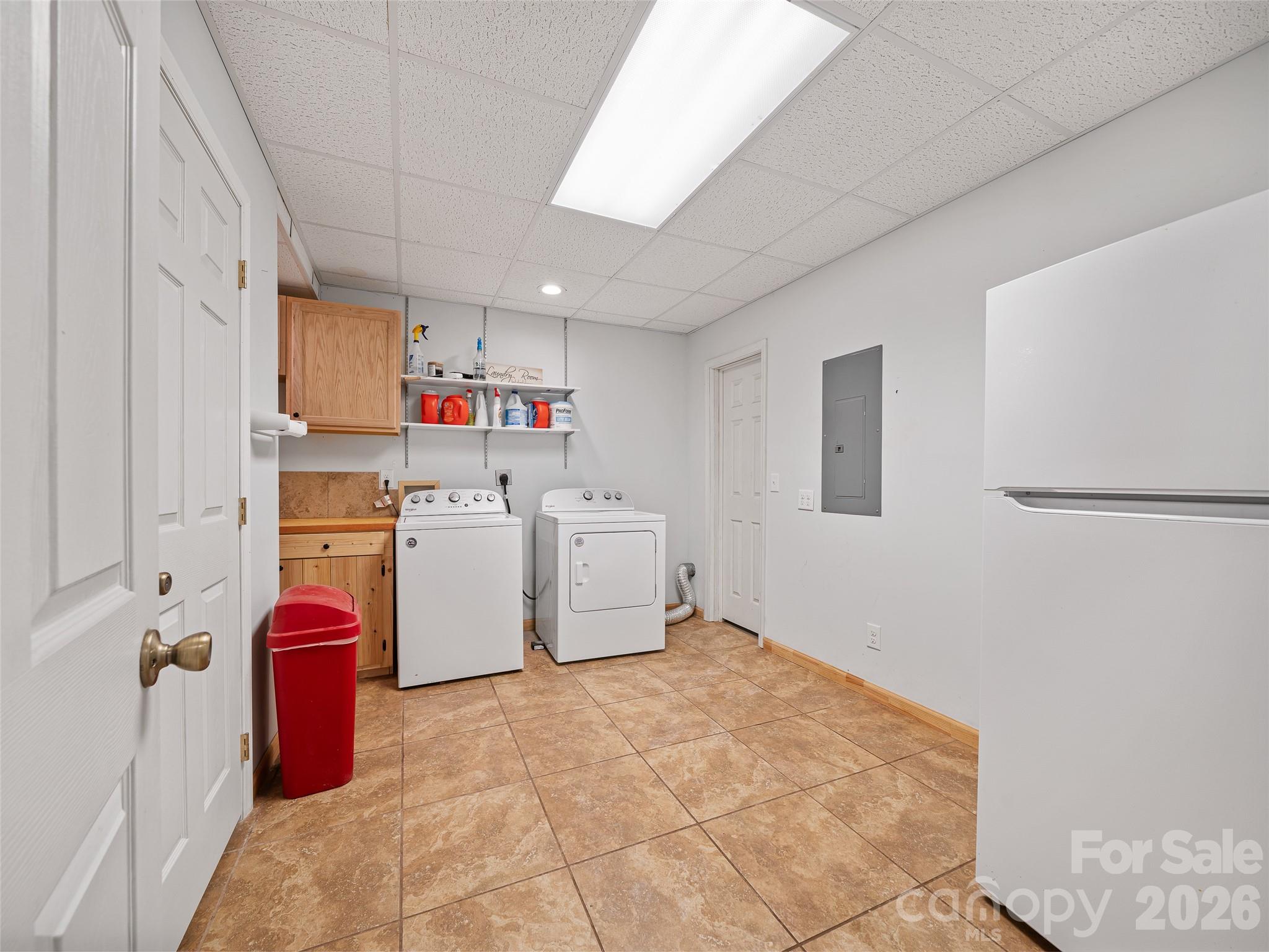 228 Continental Divide Road Spruce Pine, NC 28777 - Photo 21 of 48 a utility room with dryer and washer