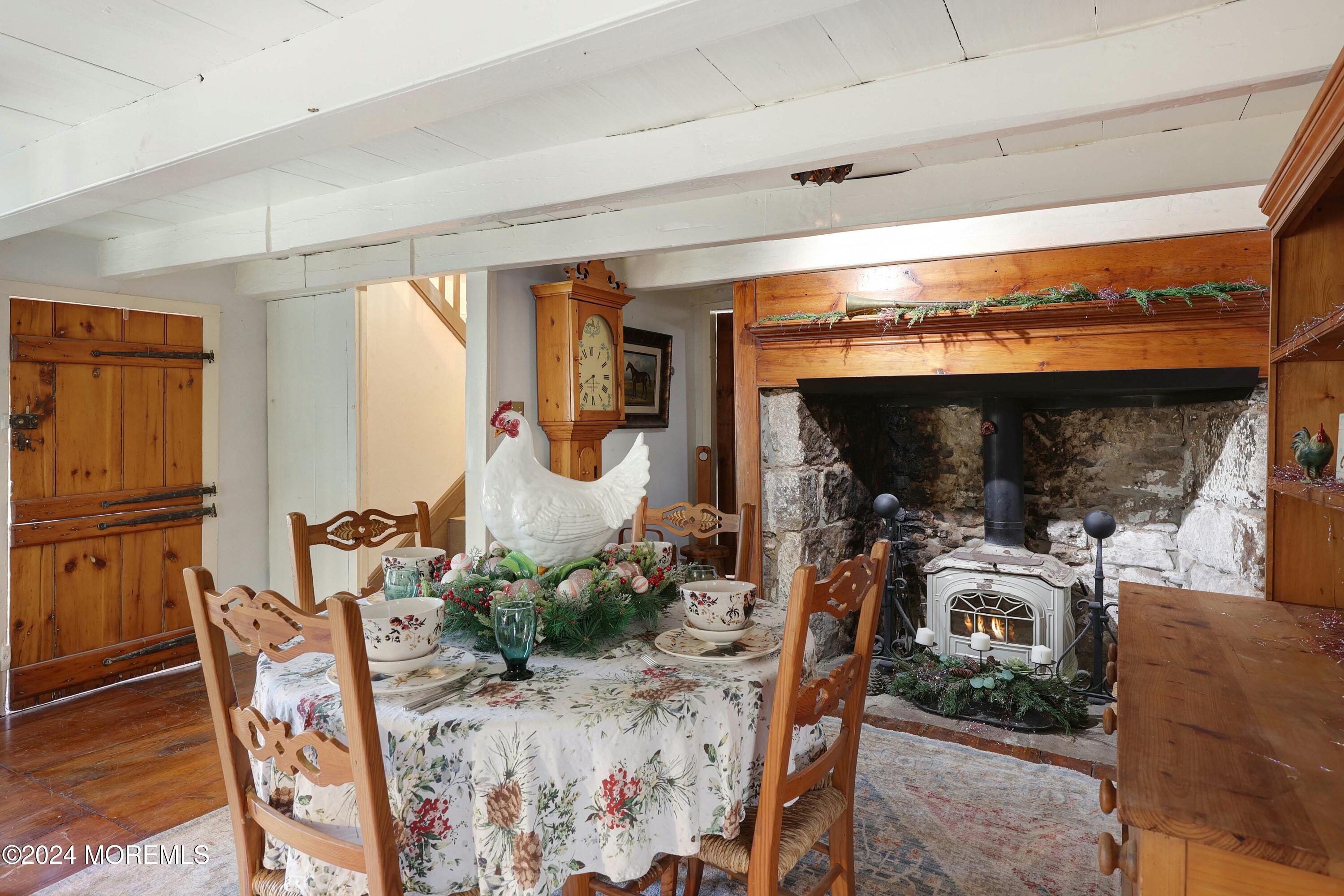 125 Sandy Ridge Road Stockton, NJ 08559 - Photo 16 of 46 a view of a dining room with furniture window and outside view