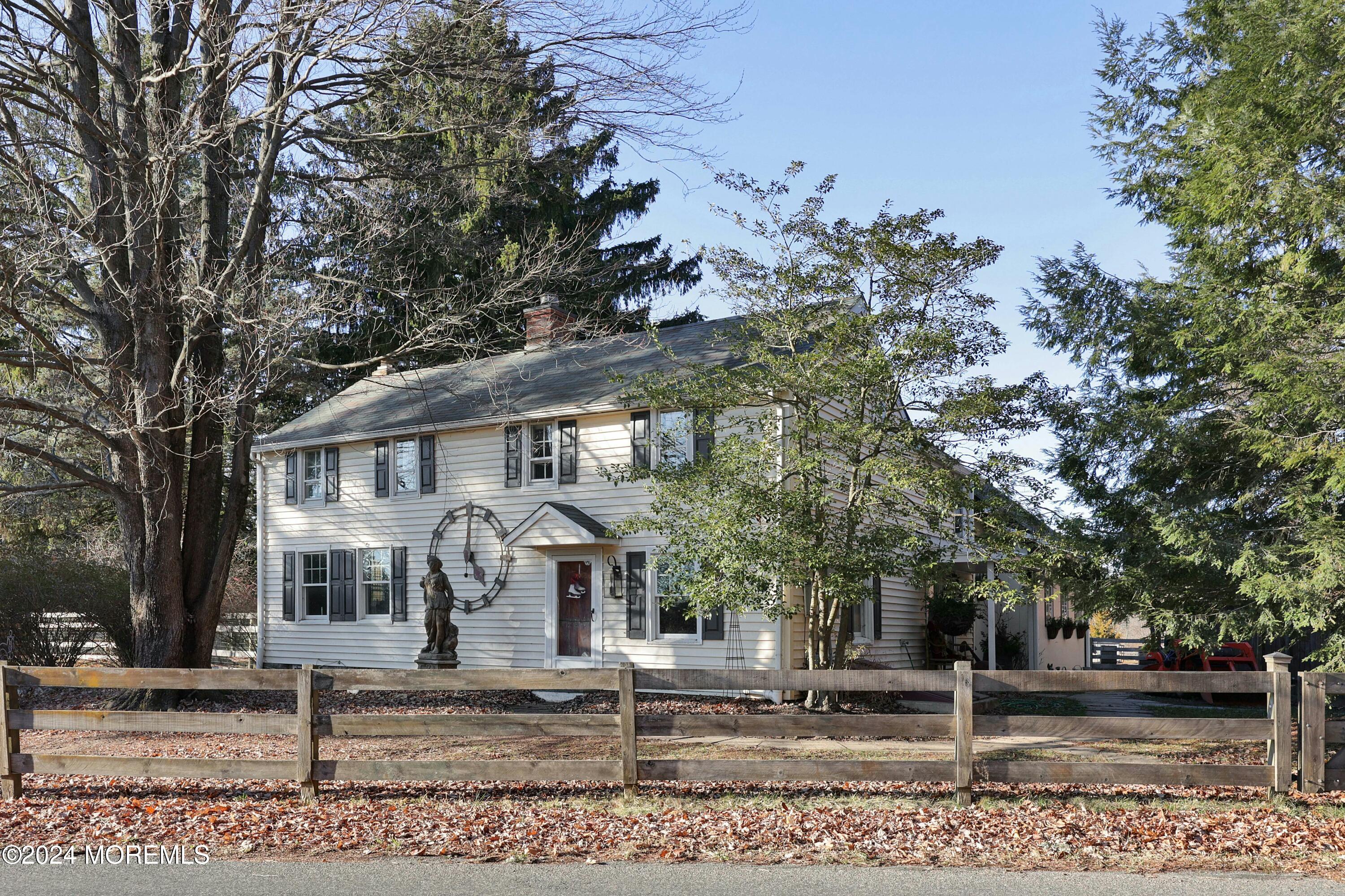125 Sandy Ridge Road Stockton, NJ 08559 - Photo 2 of 46 front view of a house with a tree