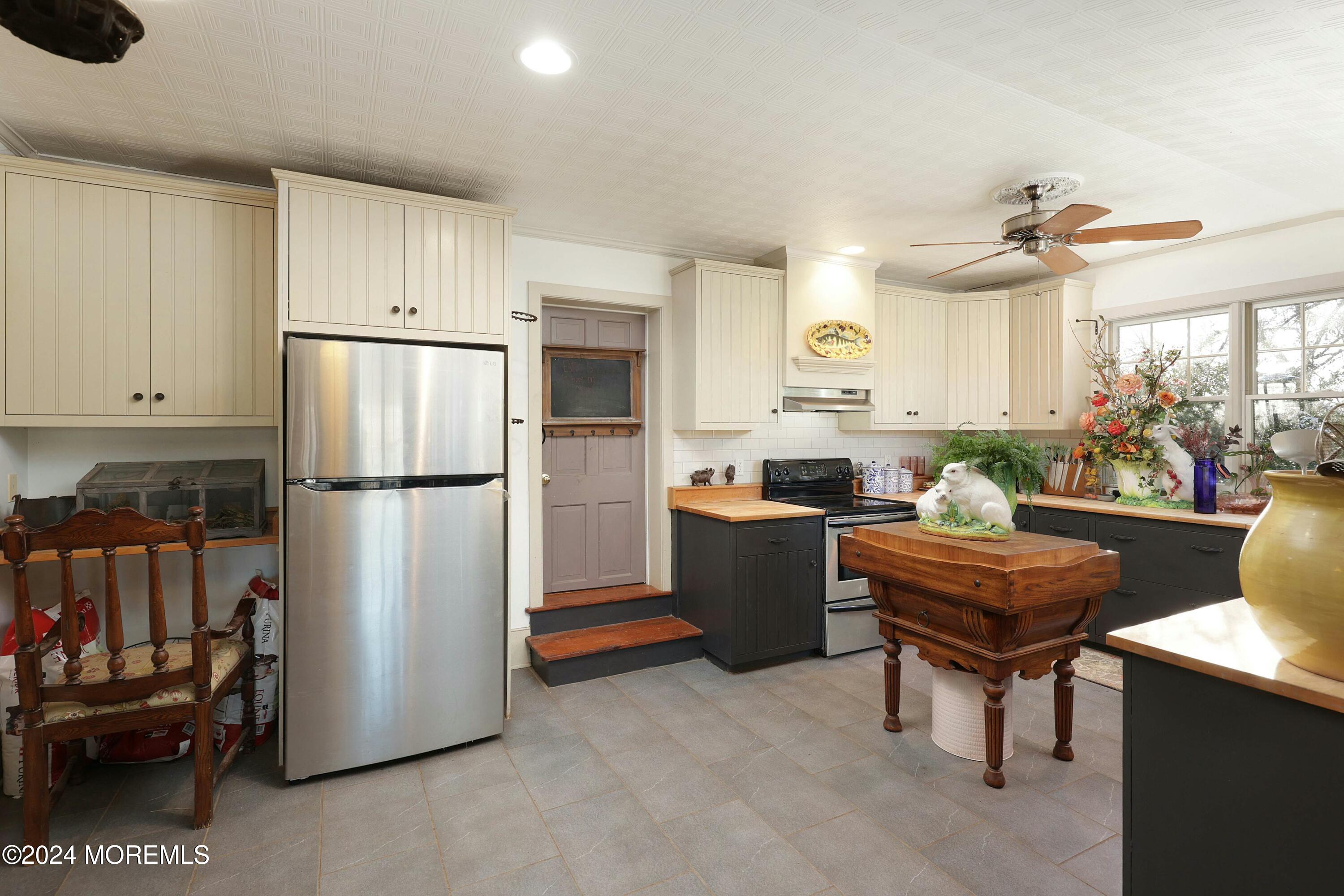 125 Sandy Ridge Road Stockton, NJ 08559 - Photo 23 of 46 a room with stainless steel appliances kitchen island granite countertop a refrigerator a stove a sink dishwasher and a dining table with the kitchen view