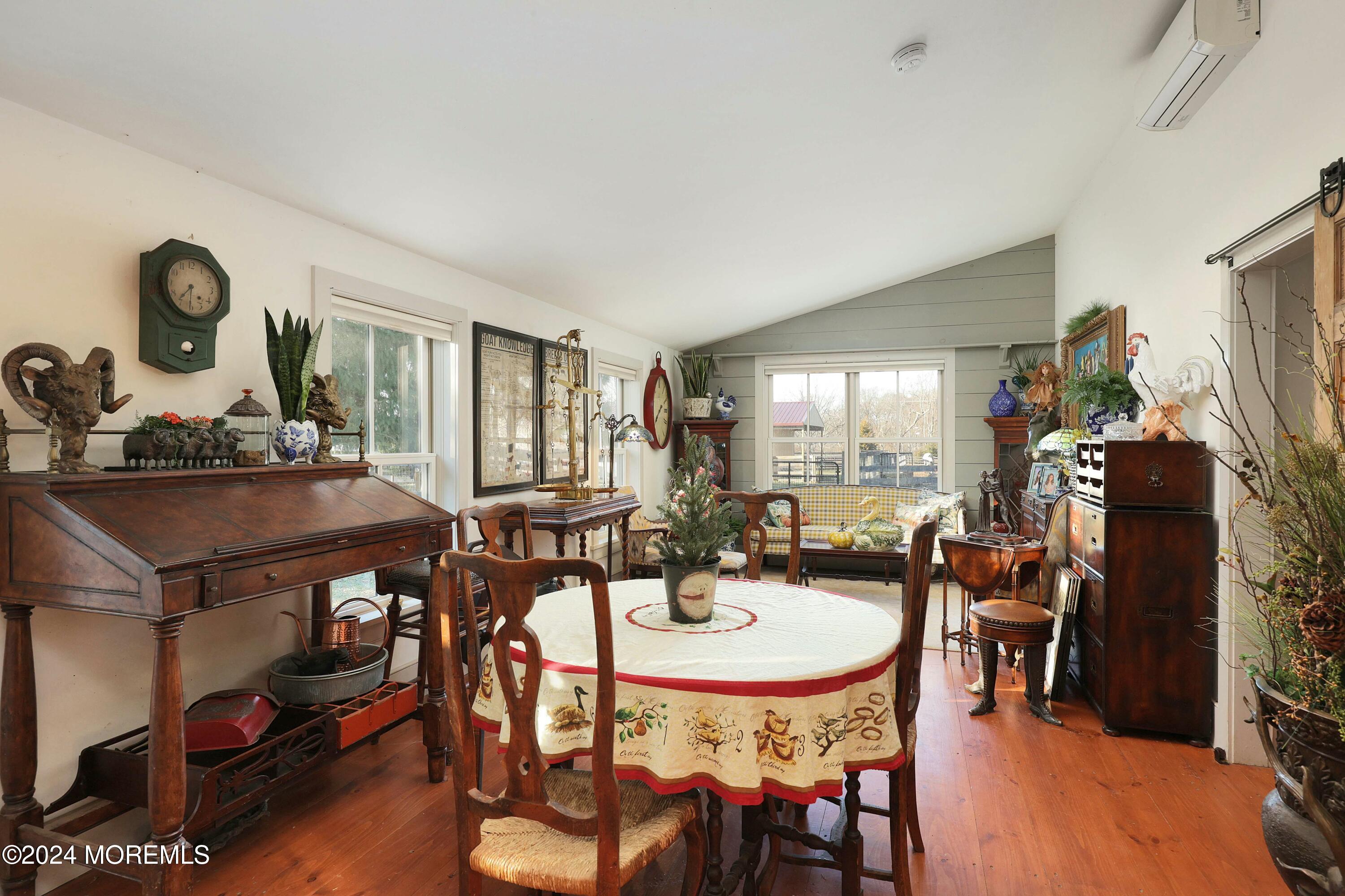 125 Sandy Ridge Road Stockton, NJ 08559 - Photo 25 of 46 a view of a dining room with furniture and wooden floor