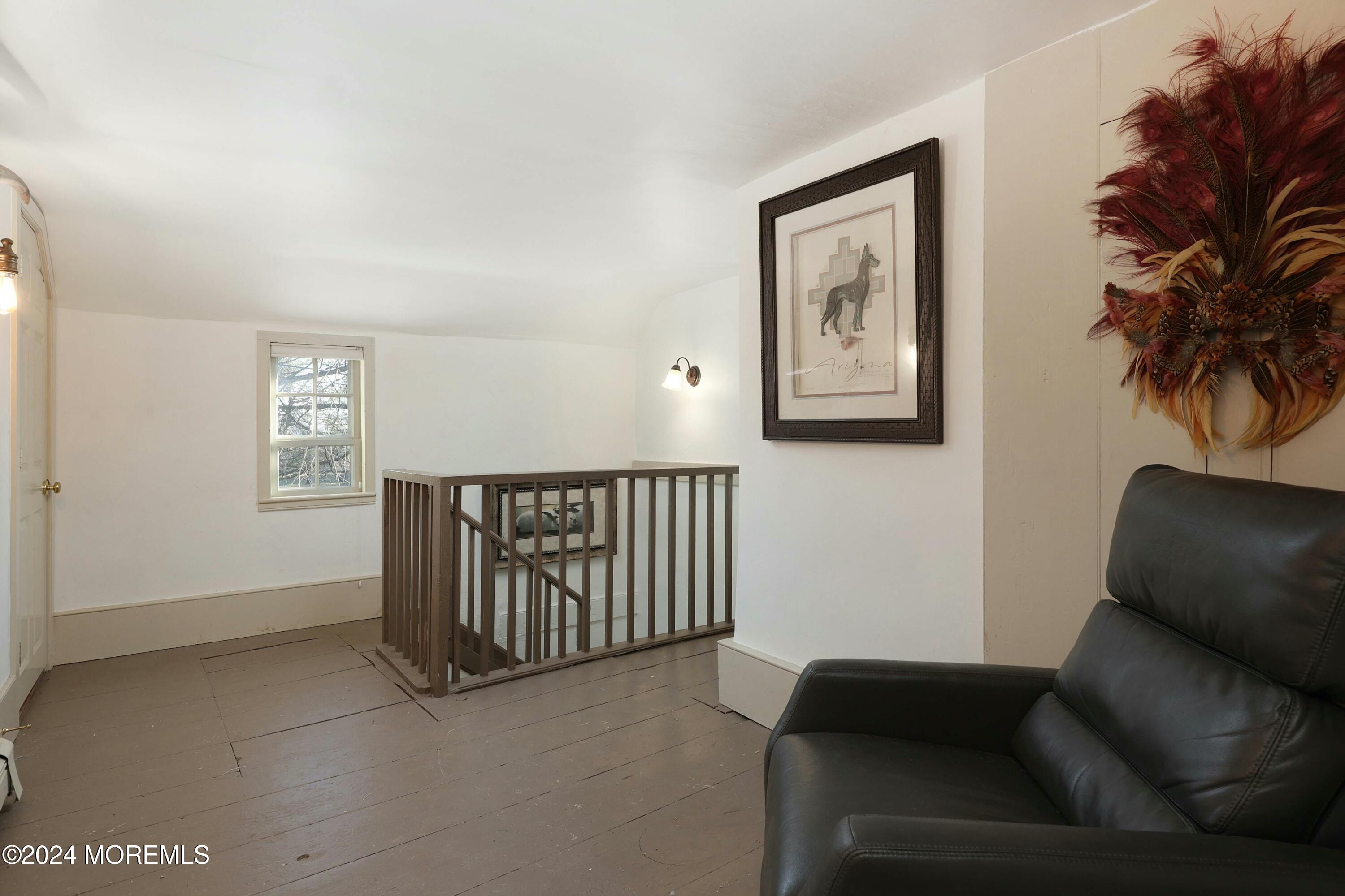 125 Sandy Ridge Road Stockton, NJ 08559 - Photo 30 of 46 a living room with furniture and a window