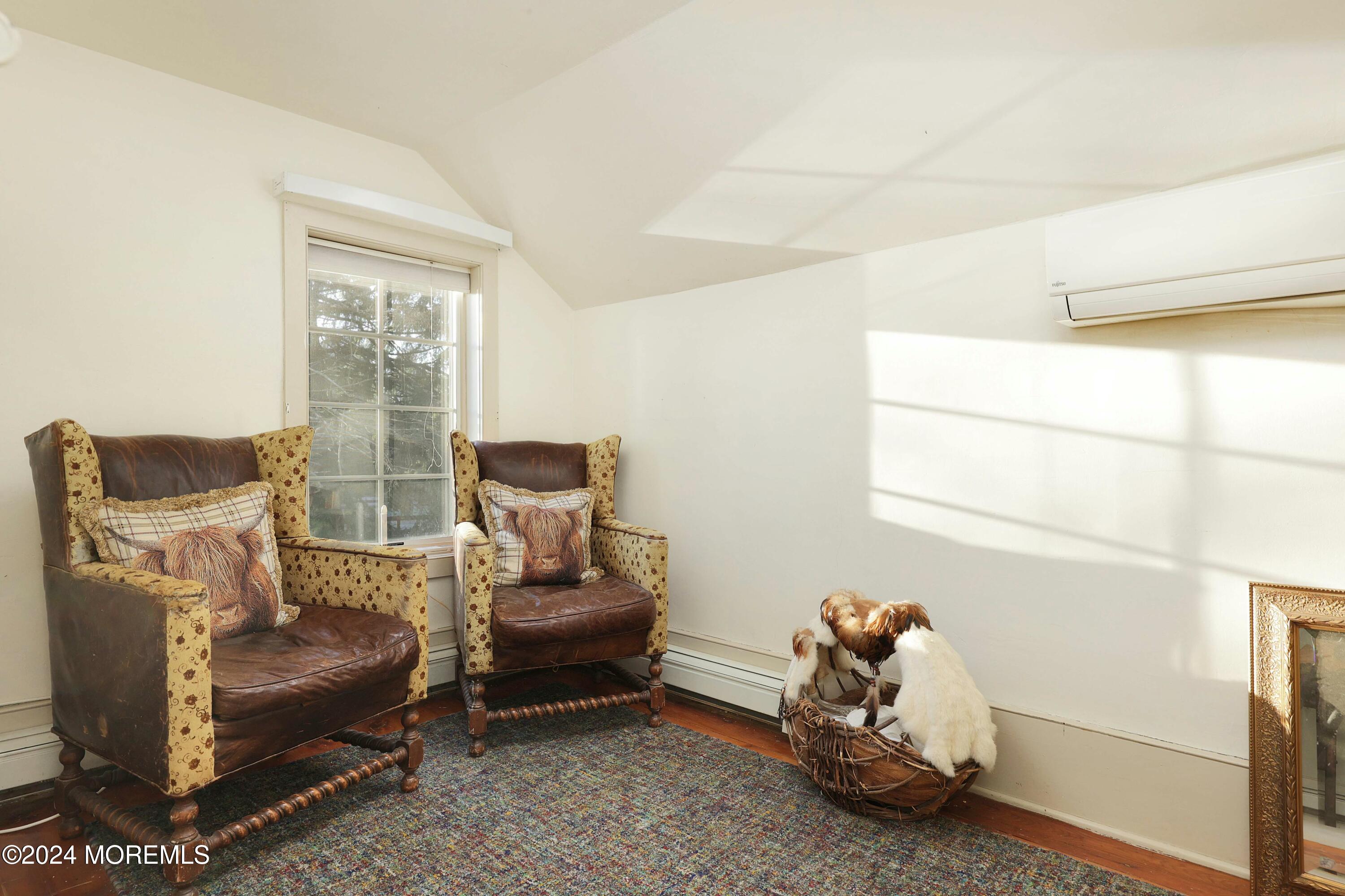 125 Sandy Ridge Road Stockton, NJ 08559 - Photo 32 of 46 a living room with furniture and a window