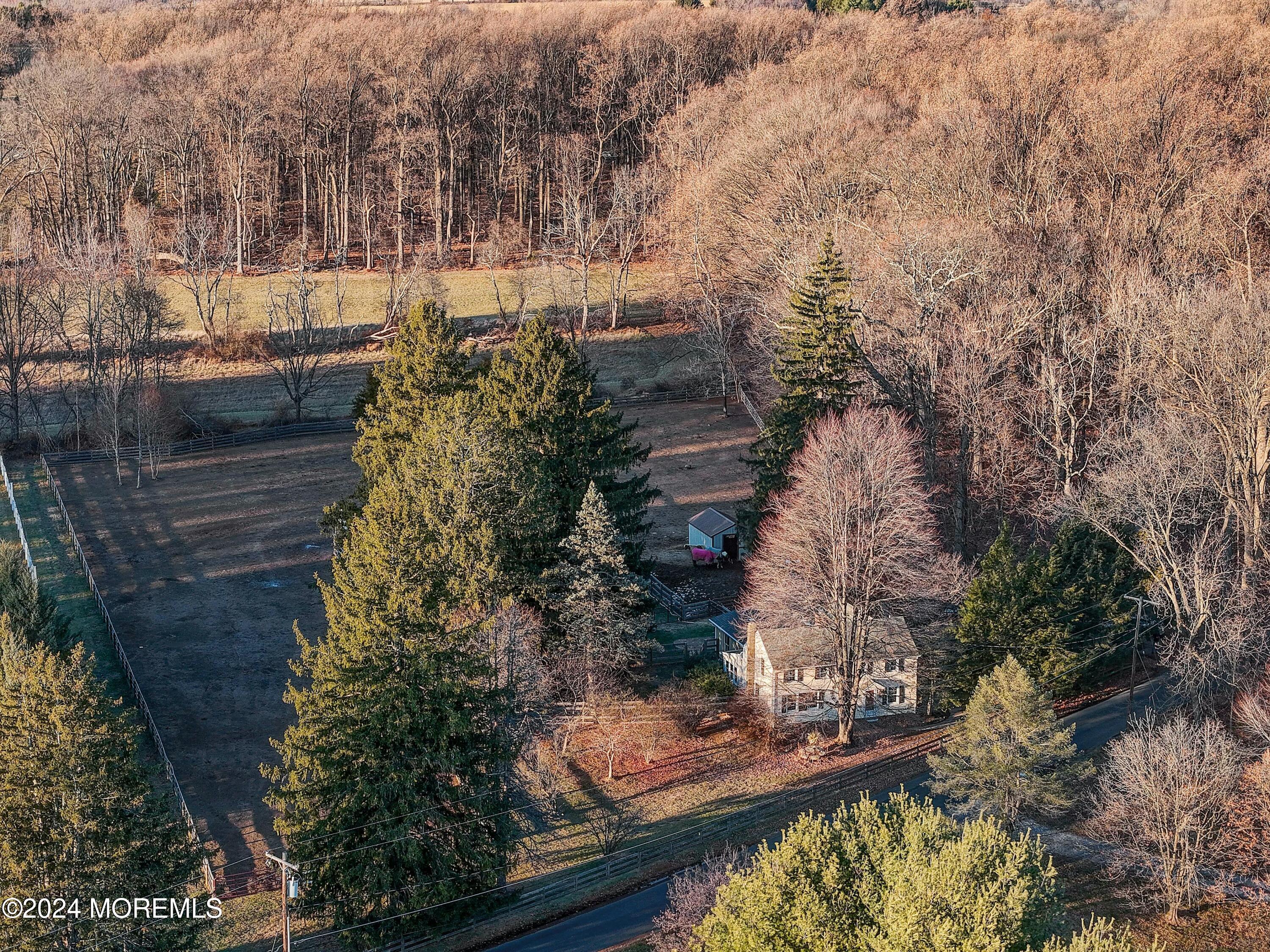 125 Sandy Ridge Road Stockton, NJ 08559 - Photo 46 of 46 a view of a lake with a house in the background