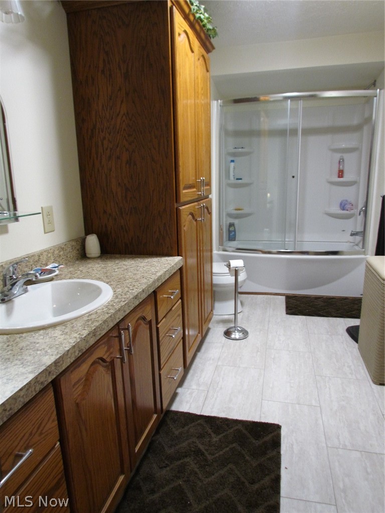 10174 Veto Road Belpre, OH 45714 - Photo 37 of 45 Lower-level bathroom with plenty of storage space with a tub/shower combo.
