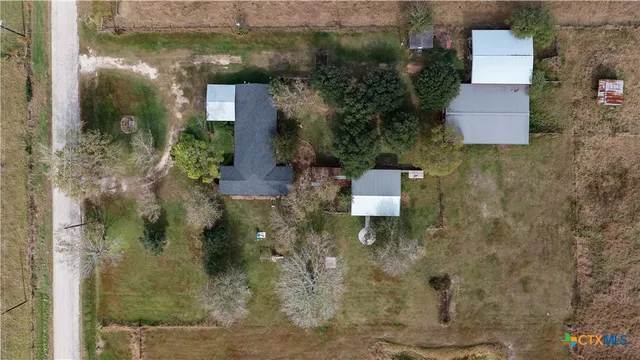 a view of a lake with a yard