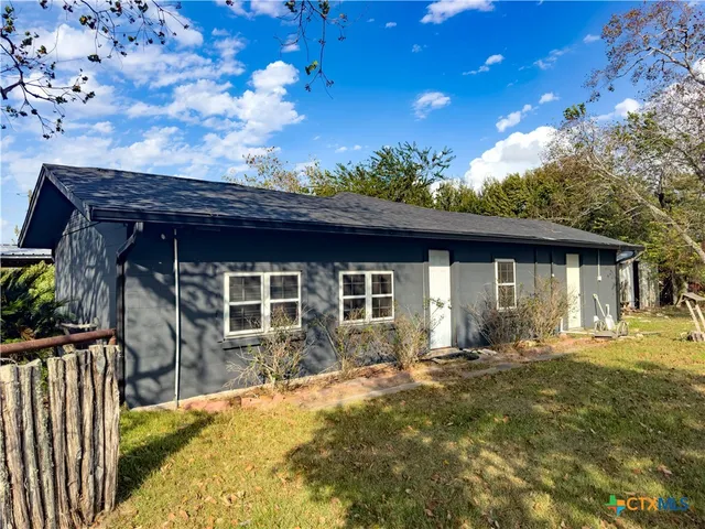 a front view of house with yard