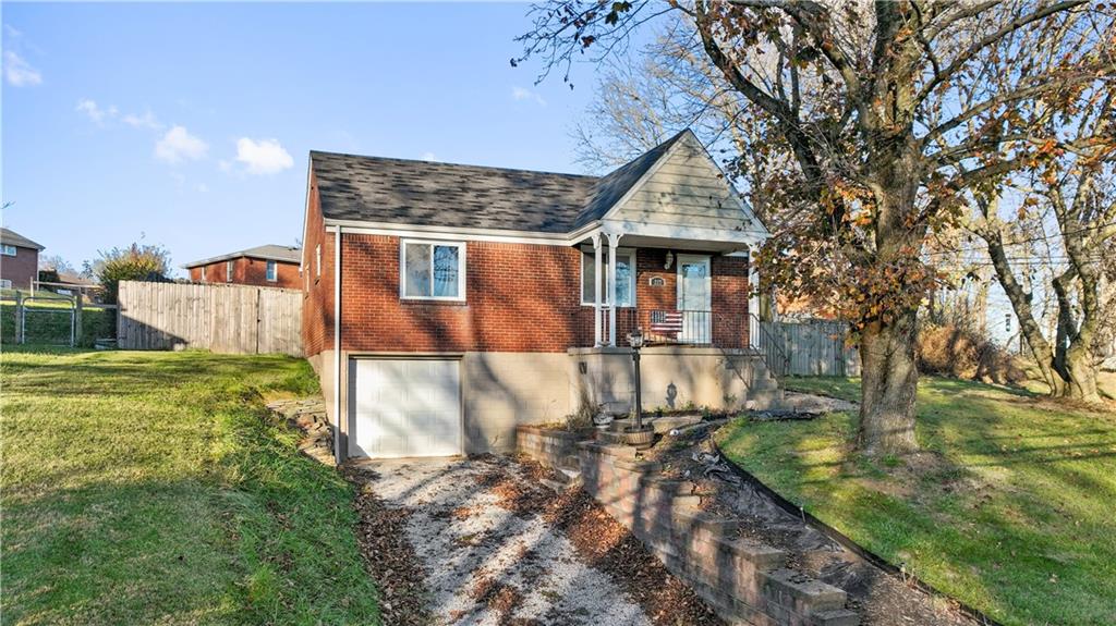 227 Duncan Station Road McKeesport, PA 15135 - Photo 1 of 10 a view of a house with backyard