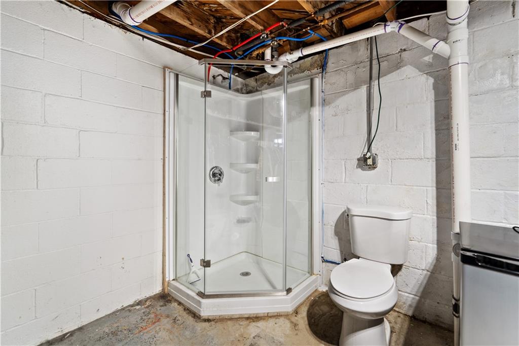 227 Duncan Station Road McKeesport, PA 15135 - Photo 8 of 10 a bathroom with a toilet and shower