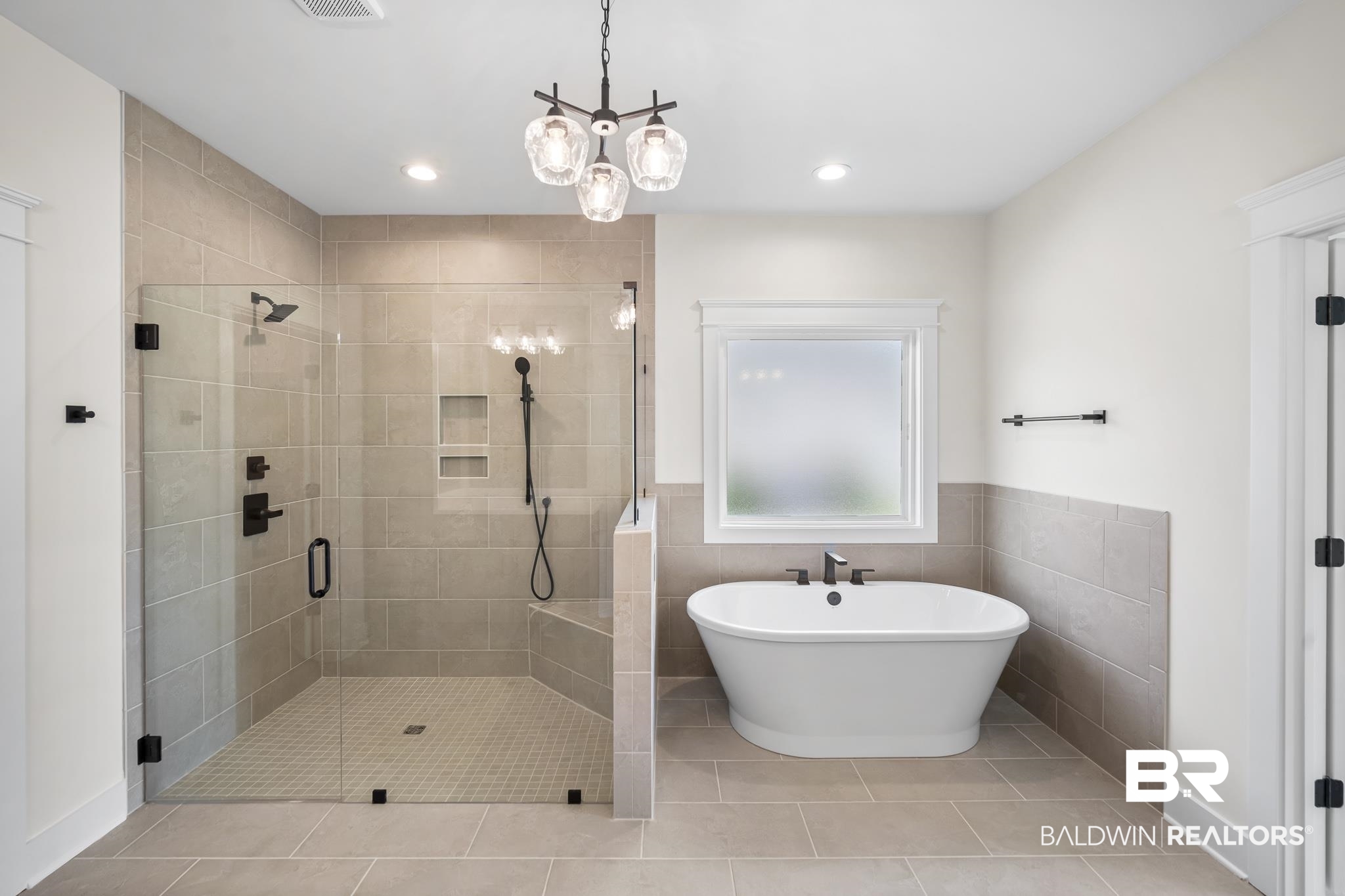 21826 Veranda Boulevard Fairhope, AL 36532 - Photo 19 of 42 Full bathroom featuring a soaking tub, a shower stall, tile patterned flooring, tile walls, and recessed lighting