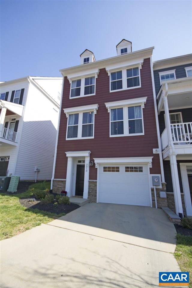 2018 Avinity Loop Charlottesville, VA 22902 - Photo 1 of 25 a front view of a building with a garden