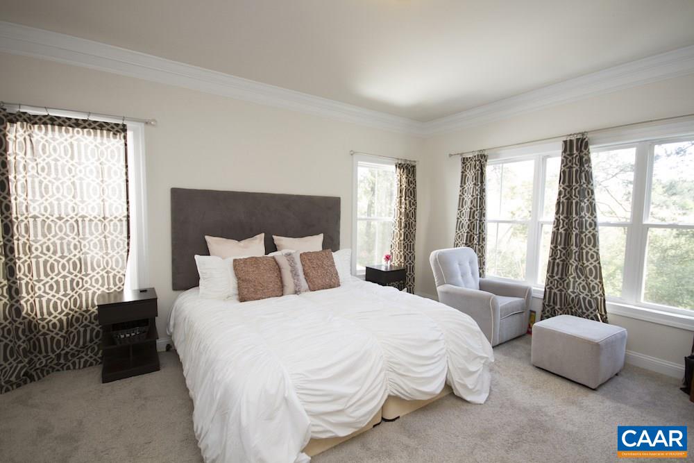 2018 Avinity Loop Charlottesville, VA 22902 - Photo 12 of 25 a bedroom with bed and large windows