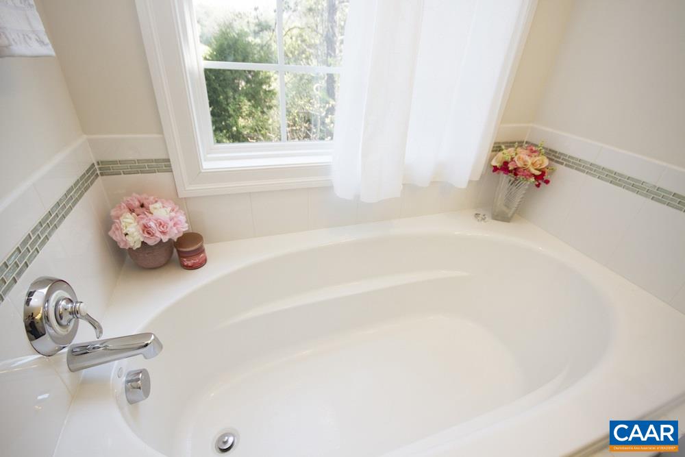 2018 Avinity Loop Charlottesville, VA 22902 - Photo 14 of 25 a bathroom with a tub