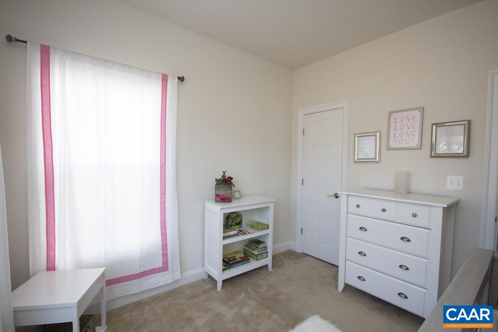 2018 Avinity Loop Charlottesville, VA 22902 - Photo 17 of 25 a room with furniture and a window