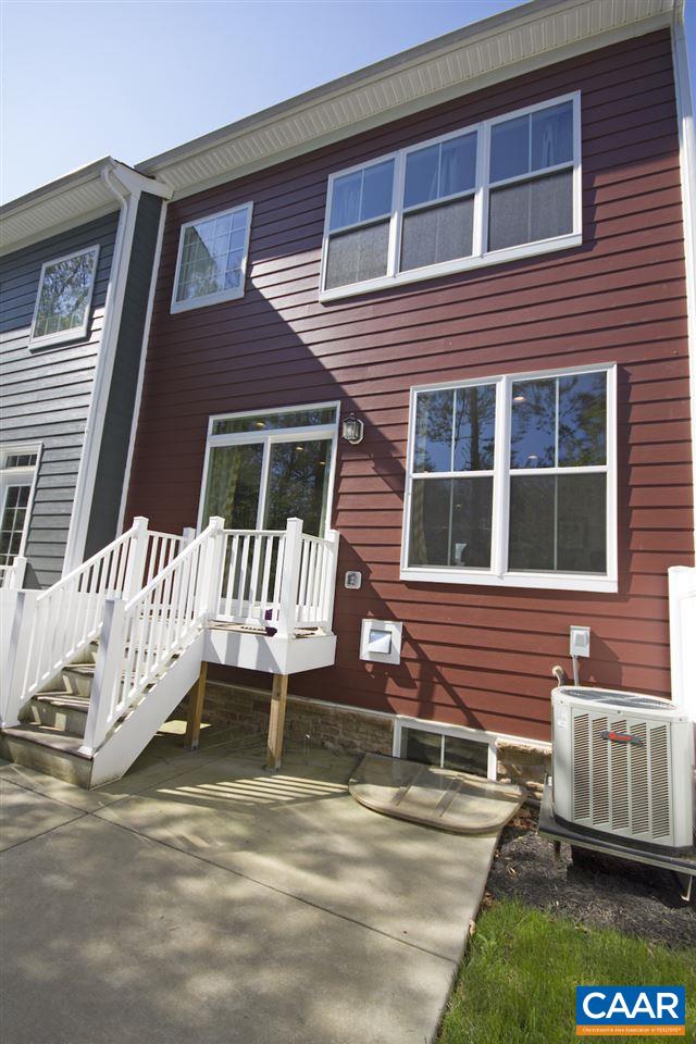 2018 Avinity Loop Charlottesville, VA 22902 - Photo 20 of 25 a front view of a house with a yard