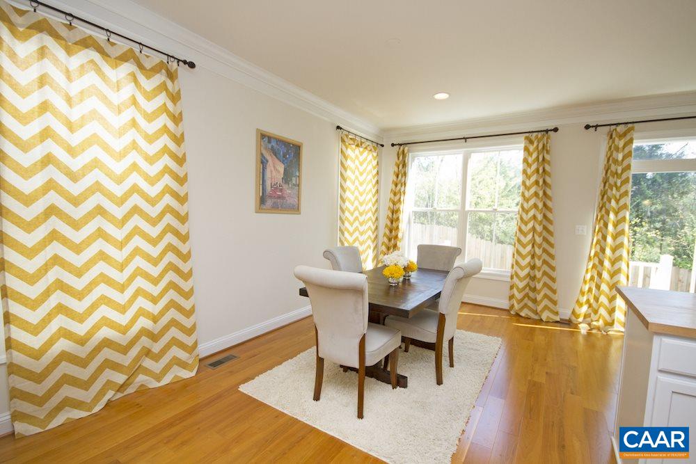 2018 Avinity Loop Charlottesville, VA 22902 - Photo 2 of 25 a workspace with furniture and a window