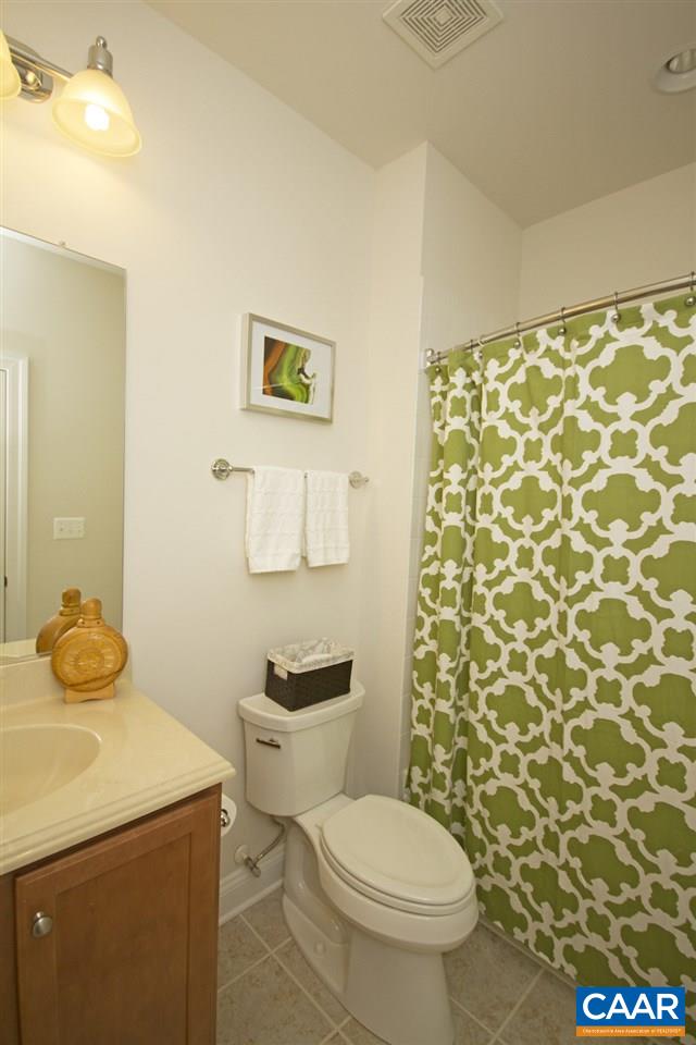 2018 Avinity Loop Charlottesville, VA 22902 - Photo 23 of 25 a bathroom with a sink toilet and shower