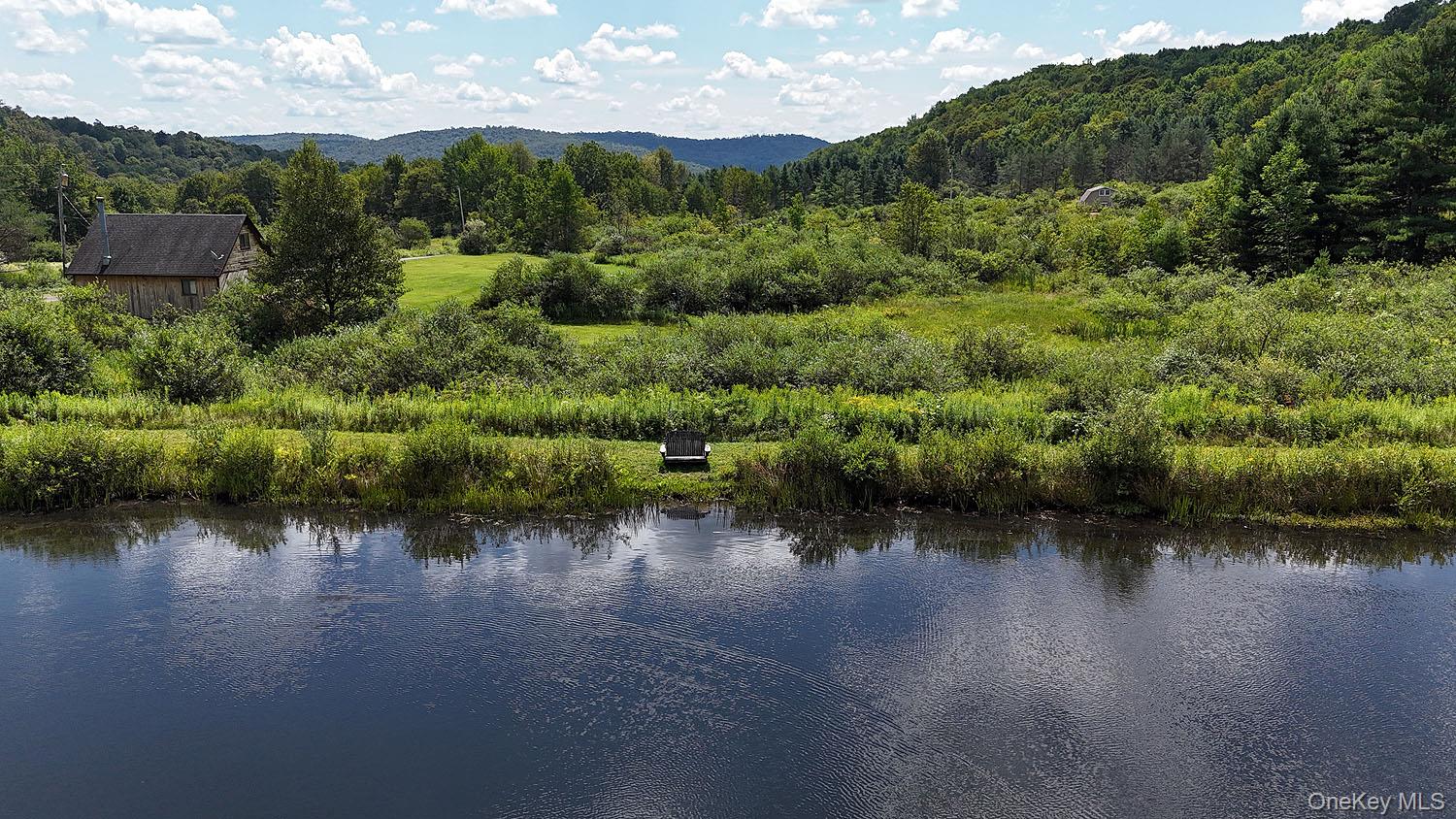 3392 Eminence Road Hancock, NY 12760 - Photo 38 of 43 an aerial view of a house with a yard basket ball court and outdoor seating